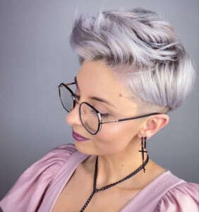 a pink blouse and a short haircut 2